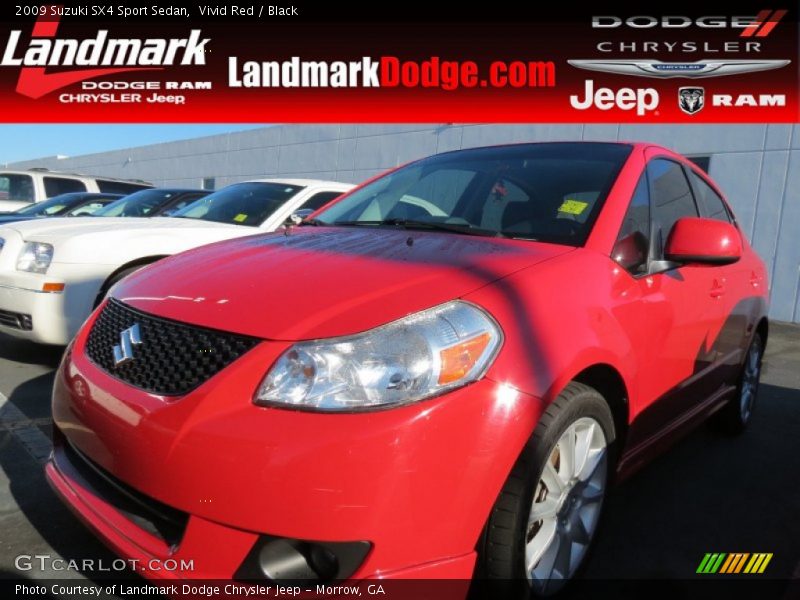 Vivid Red / Black 2009 Suzuki SX4 Sport Sedan