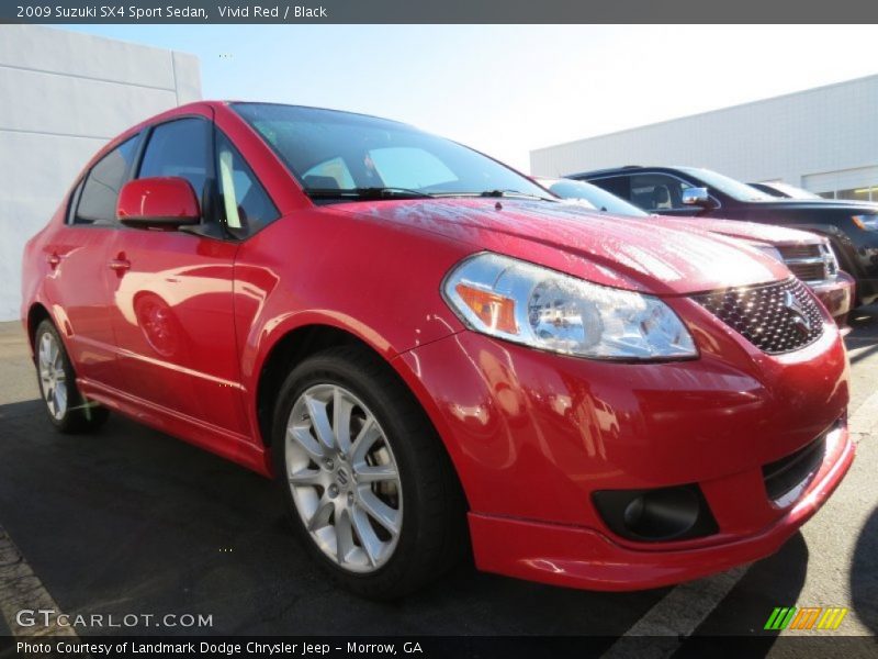 Vivid Red / Black 2009 Suzuki SX4 Sport Sedan