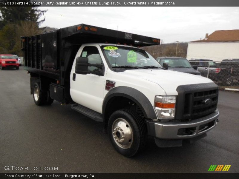 Front 3/4 View of 2010 F450 Super Duty Regular Cab 4x4 Chassis Dump Truck
