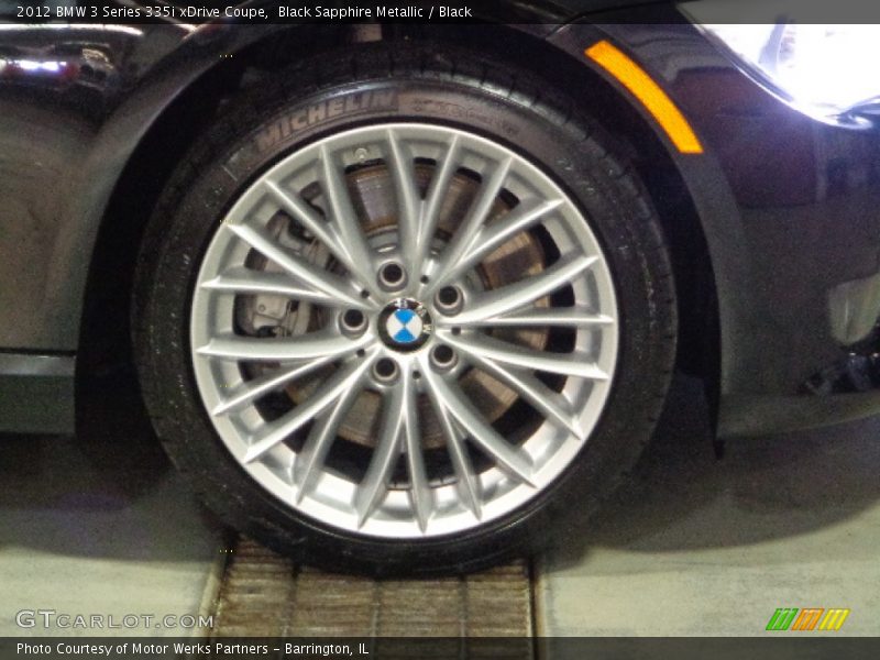 Black Sapphire Metallic / Black 2012 BMW 3 Series 335i xDrive Coupe
