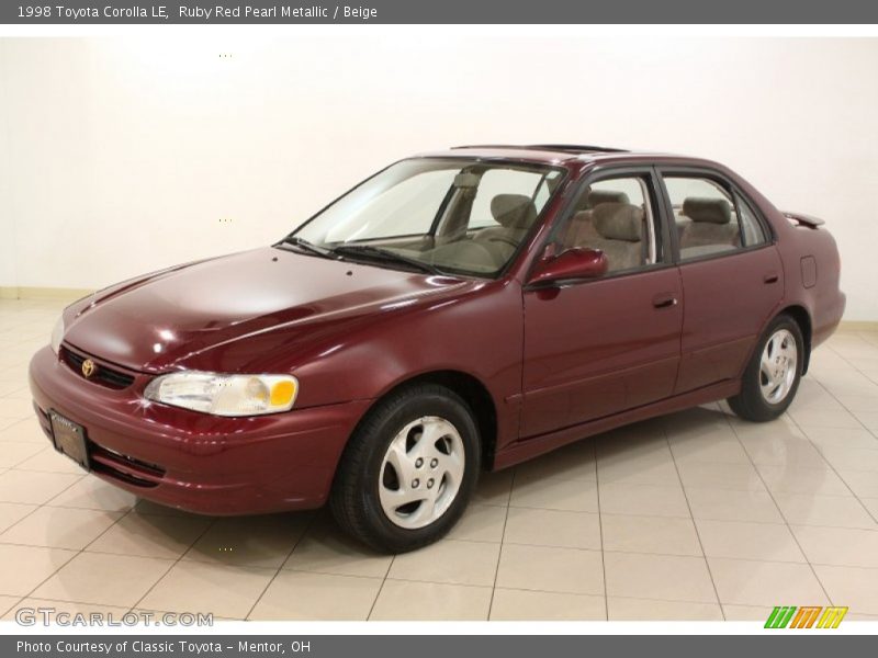 Ruby Red Pearl Metallic / Beige 1998 Toyota Corolla LE