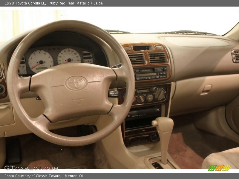Ruby Red Pearl Metallic / Beige 1998 Toyota Corolla LE