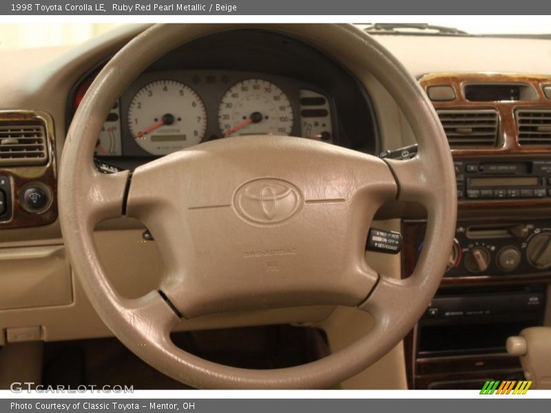 Ruby Red Pearl Metallic / Beige 1998 Toyota Corolla LE