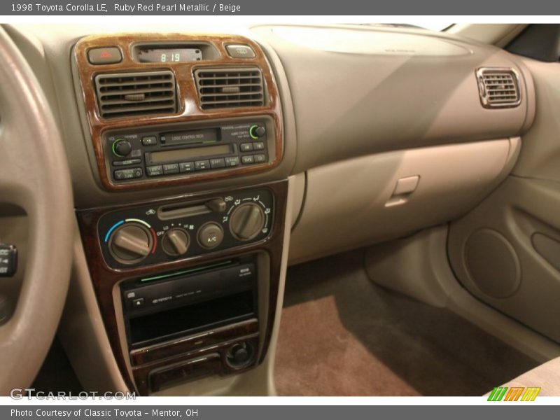 Ruby Red Pearl Metallic / Beige 1998 Toyota Corolla LE