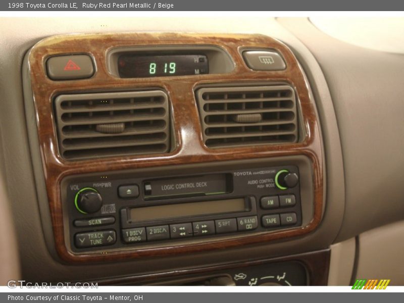 Ruby Red Pearl Metallic / Beige 1998 Toyota Corolla LE