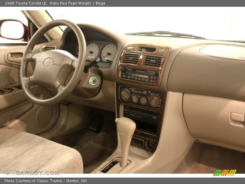 Ruby Red Pearl Metallic / Beige 1998 Toyota Corolla LE