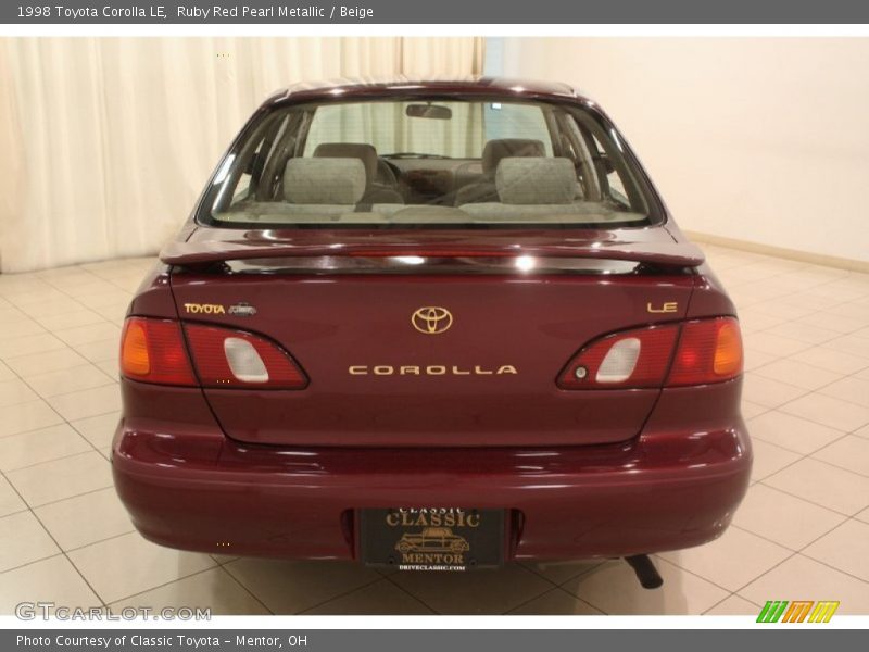 Ruby Red Pearl Metallic / Beige 1998 Toyota Corolla LE
