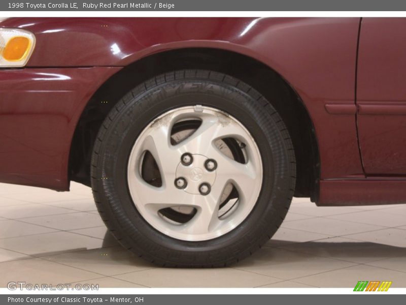 Ruby Red Pearl Metallic / Beige 1998 Toyota Corolla LE