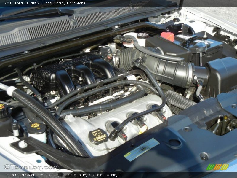 Ingot Silver / Light Stone 2011 Ford Taurus SE