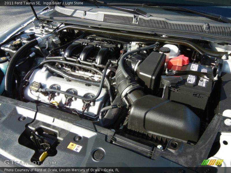 Ingot Silver / Light Stone 2011 Ford Taurus SE