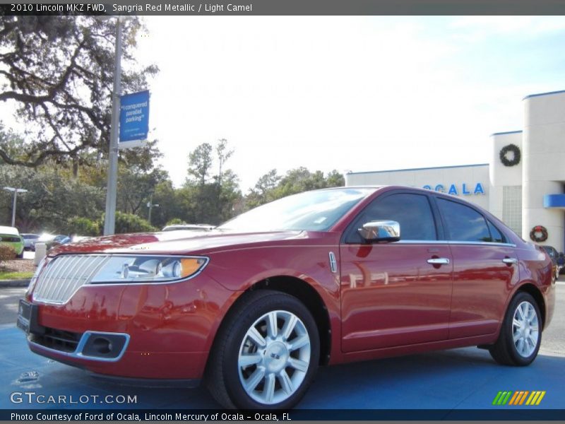 Sangria Red Metallic / Light Camel 2010 Lincoln MKZ FWD