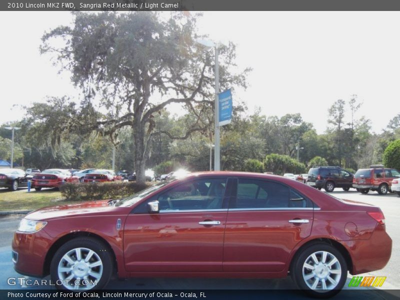 Sangria Red Metallic / Light Camel 2010 Lincoln MKZ FWD