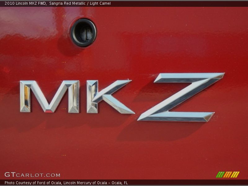Sangria Red Metallic / Light Camel 2010 Lincoln MKZ FWD