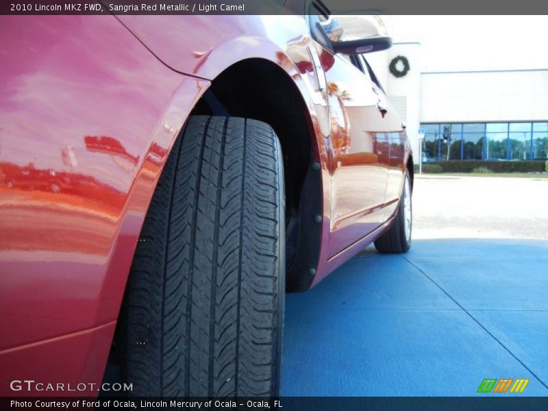Sangria Red Metallic / Light Camel 2010 Lincoln MKZ FWD