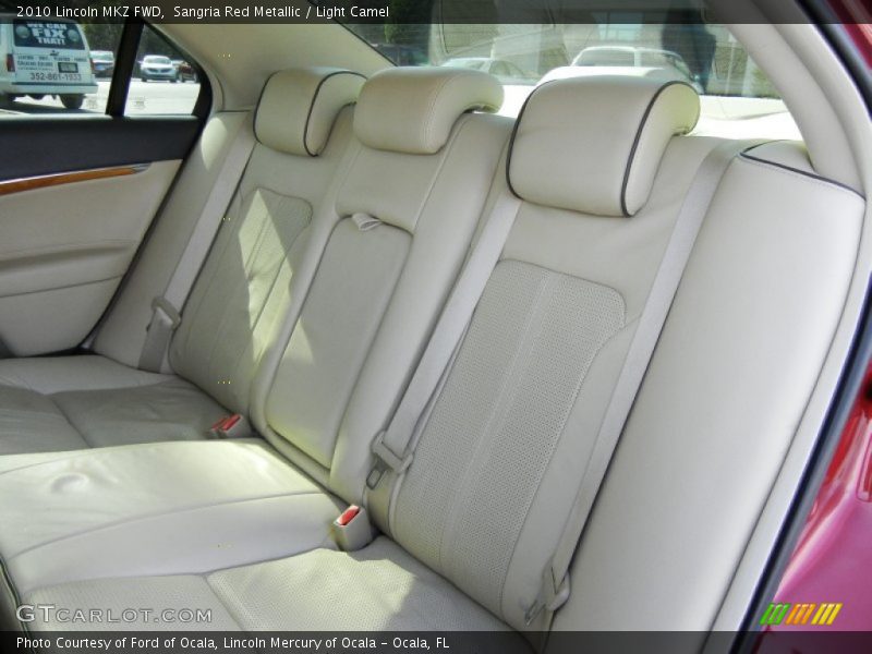 Sangria Red Metallic / Light Camel 2010 Lincoln MKZ FWD