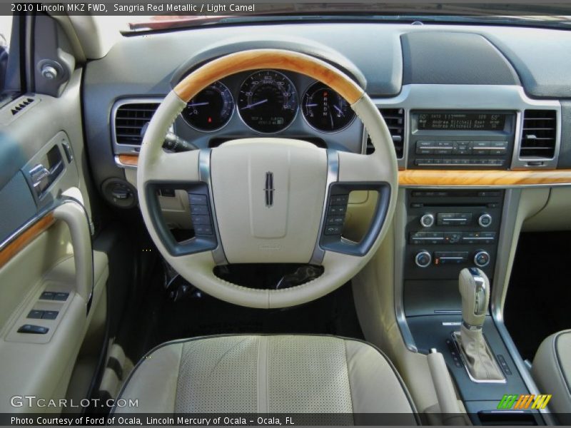 Sangria Red Metallic / Light Camel 2010 Lincoln MKZ FWD