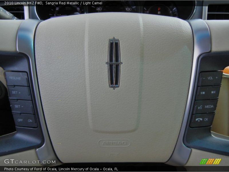 Sangria Red Metallic / Light Camel 2010 Lincoln MKZ FWD