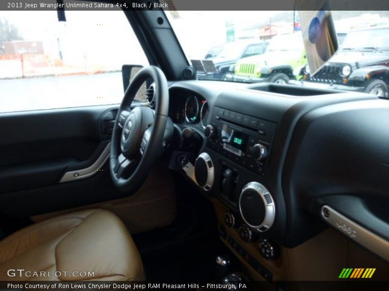 Black / Black 2013 Jeep Wrangler Unlimited Sahara 4x4