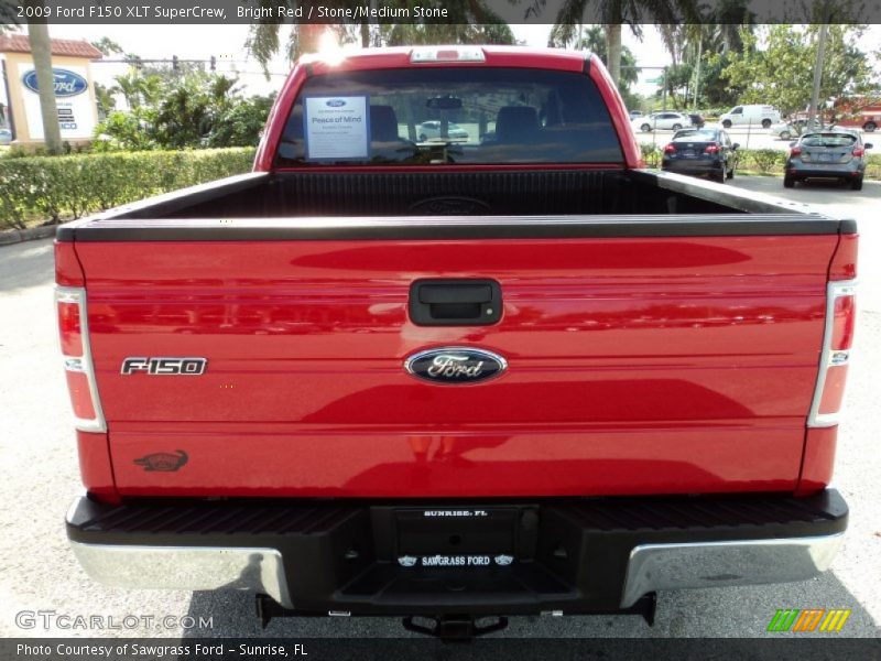 Bright Red / Stone/Medium Stone 2009 Ford F150 XLT SuperCrew