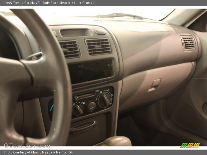 Satin Black Metallic / Light Charcoal 1999 Toyota Corolla VE