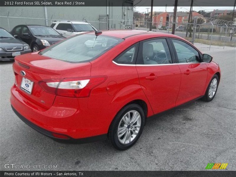 Race Red / Stone 2012 Ford Focus SEL Sedan