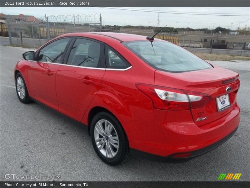 Race Red / Stone 2012 Ford Focus SEL Sedan