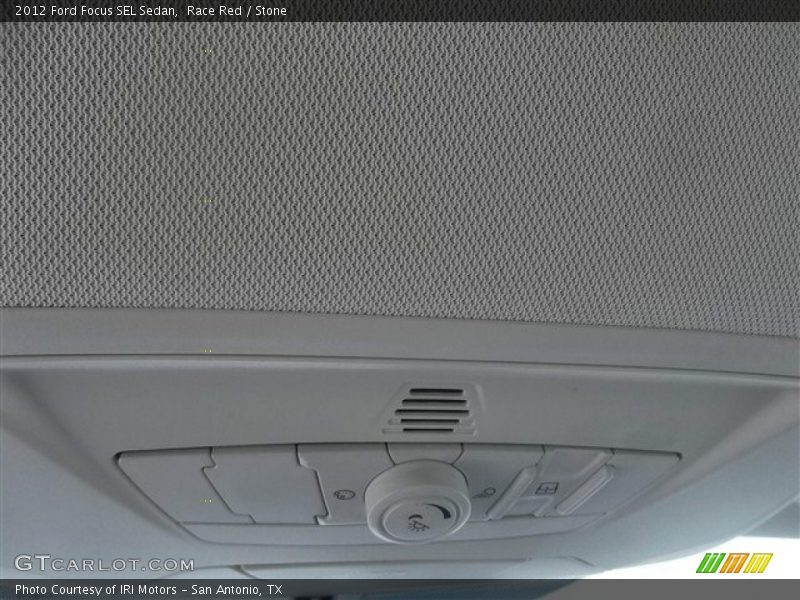 Race Red / Stone 2012 Ford Focus SEL Sedan