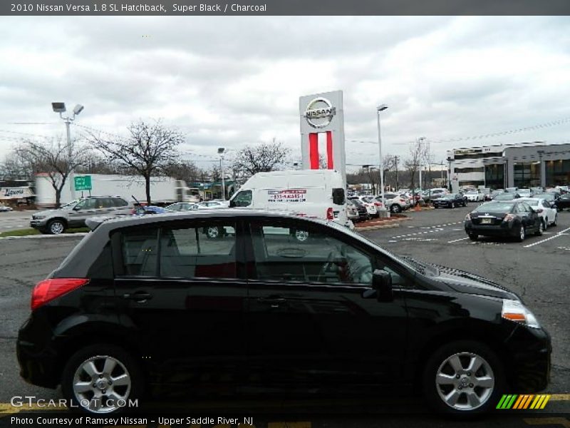 Super Black / Charcoal 2010 Nissan Versa 1.8 SL Hatchback