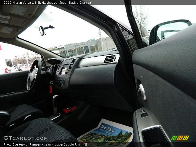 Super Black / Charcoal 2010 Nissan Versa 1.8 SL Hatchback