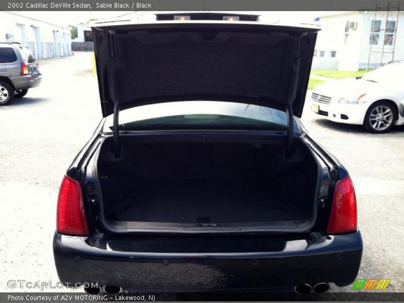 Sable Black / Black 2002 Cadillac DeVille Sedan