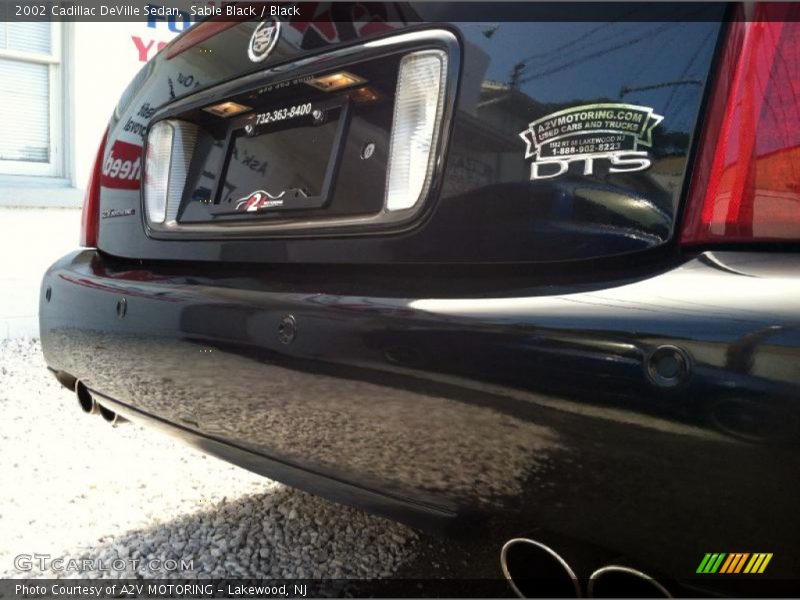 Sable Black / Black 2002 Cadillac DeVille Sedan