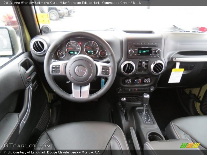 Dashboard of 2013 Wrangler Unlimited Oscar Mike Freedom Edition 4x4