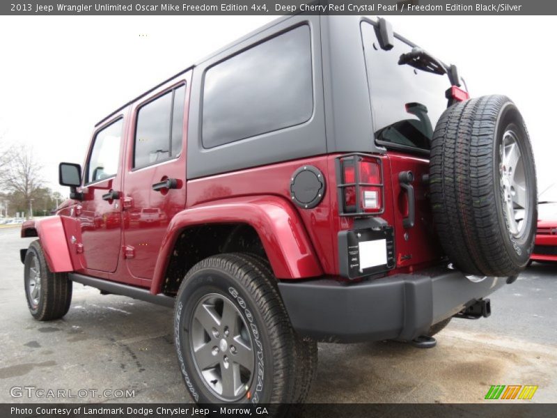 Deep Cherry Red Crystal Pearl / Freedom Edition Black/Silver 2013 Jeep Wrangler Unlimited Oscar Mike Freedom Edition 4x4