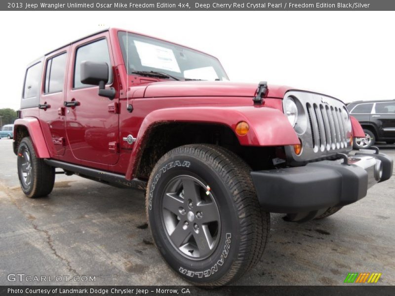 Deep Cherry Red Crystal Pearl / Freedom Edition Black/Silver 2013 Jeep Wrangler Unlimited Oscar Mike Freedom Edition 4x4