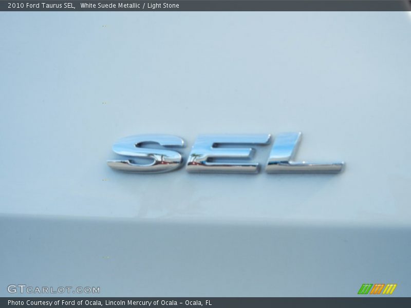 White Suede Metallic / Light Stone 2010 Ford Taurus SEL