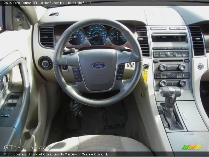 White Suede Metallic / Light Stone 2010 Ford Taurus SEL