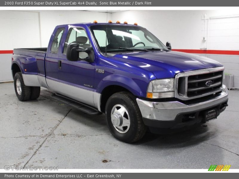 Front 3/4 View of 2003 F350 Super Duty XL SuperCab 4x4 Dually