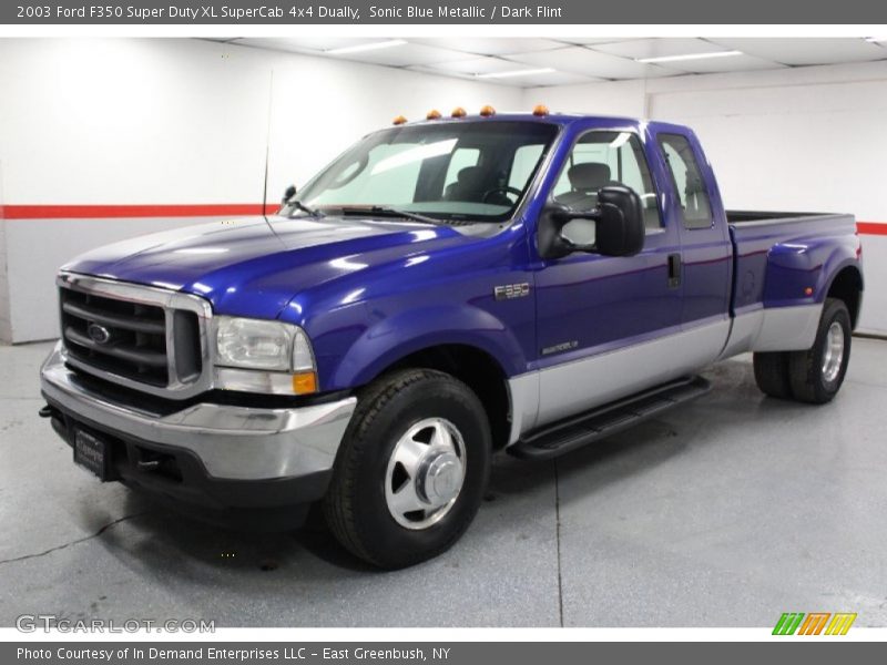 Front 3/4 View of 2003 F350 Super Duty XL SuperCab 4x4 Dually