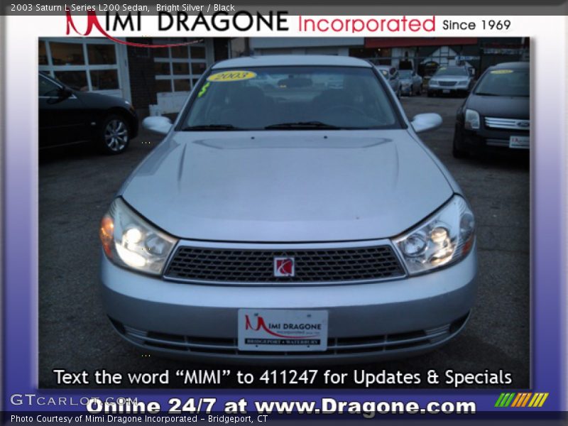 Bright Silver / Black 2003 Saturn L Series L200 Sedan