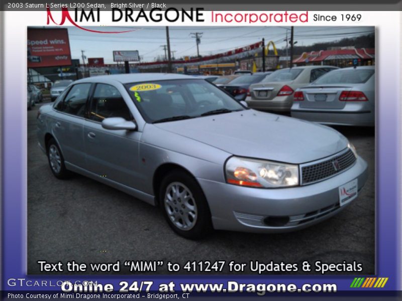 Bright Silver / Black 2003 Saturn L Series L200 Sedan