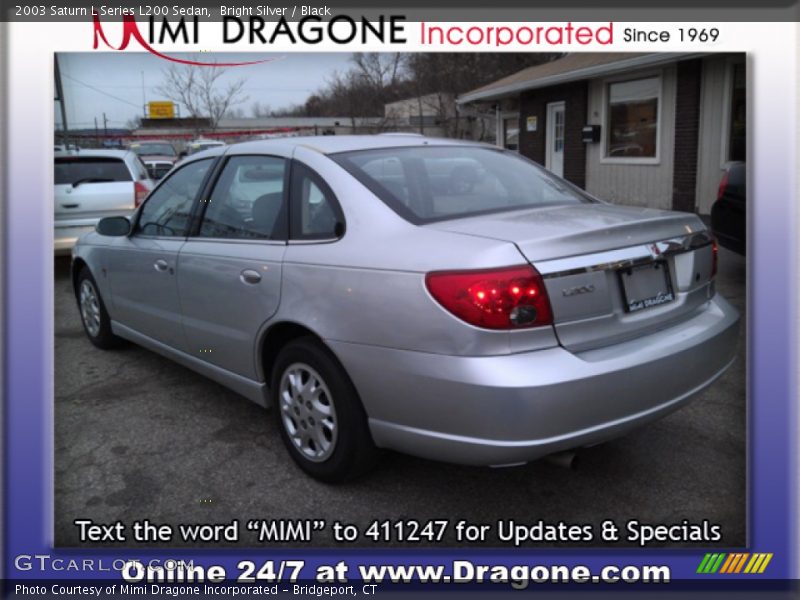 Bright Silver / Black 2003 Saturn L Series L200 Sedan