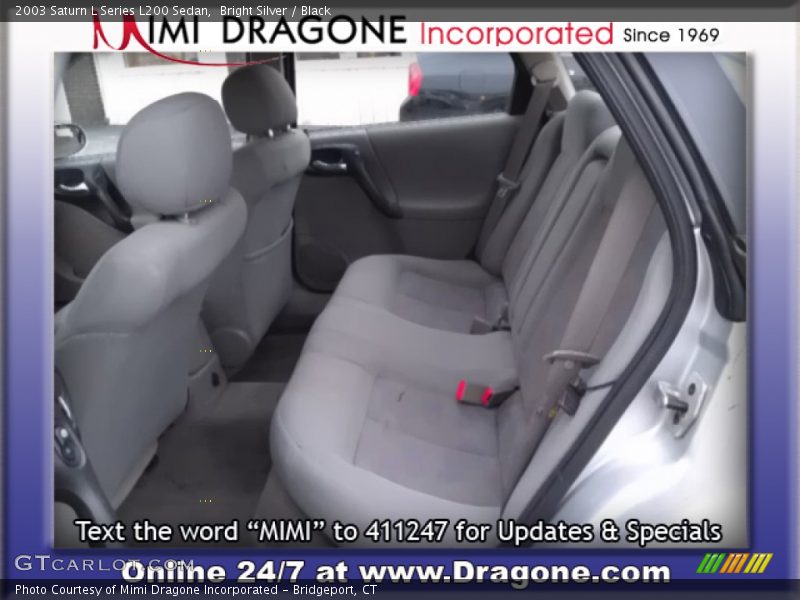 Bright Silver / Black 2003 Saturn L Series L200 Sedan