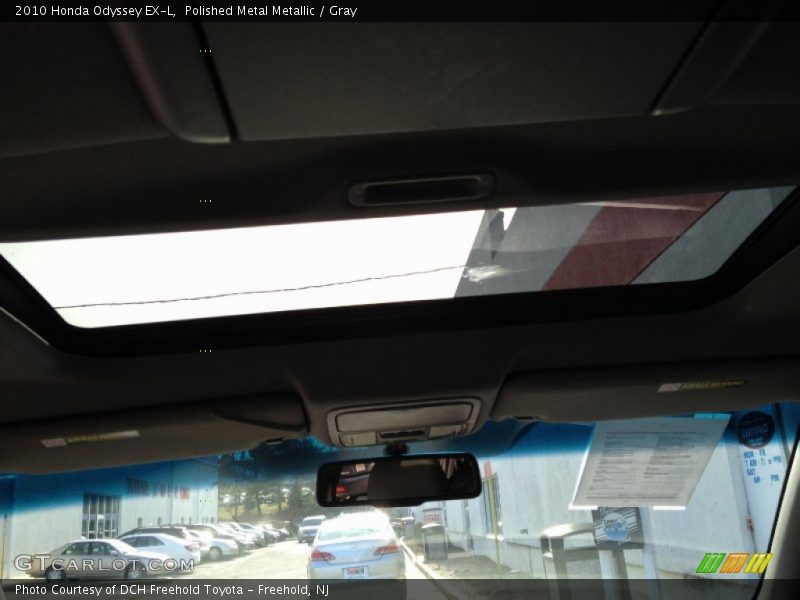 Polished Metal Metallic / Gray 2010 Honda Odyssey EX-L