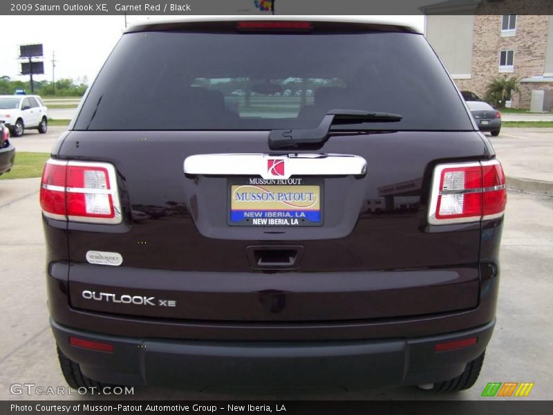 Garnet Red / Black 2009 Saturn Outlook XE