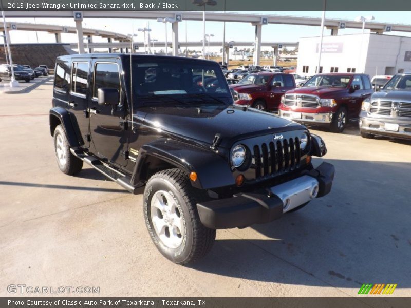 Black / Black 2013 Jeep Wrangler Unlimited Sahara 4x4