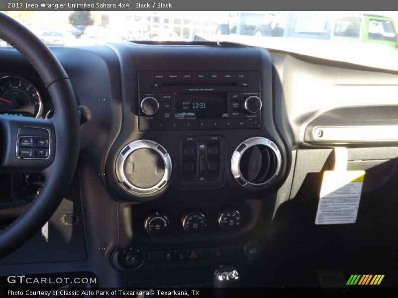 Black / Black 2013 Jeep Wrangler Unlimited Sahara 4x4