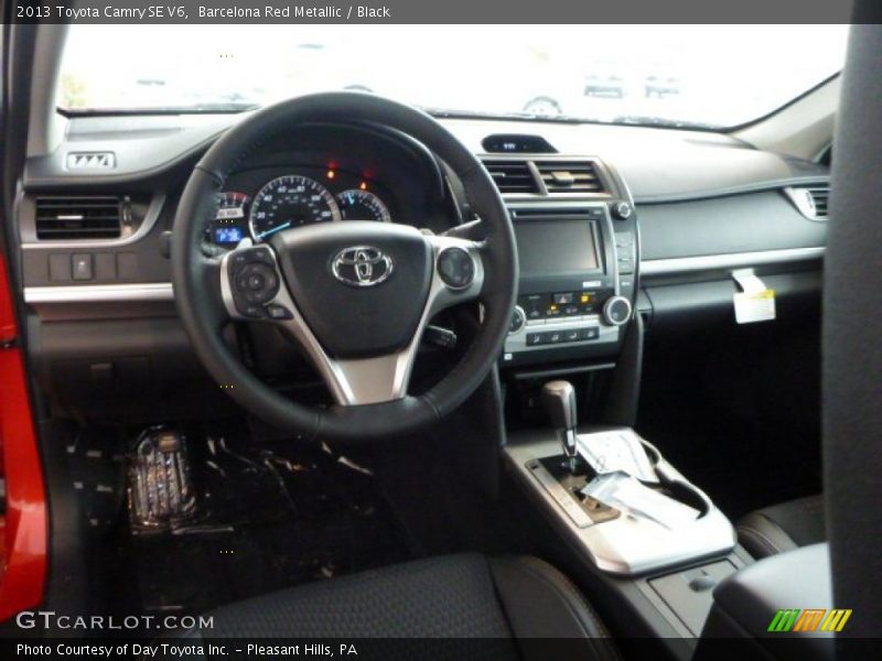 Dashboard of 2013 Camry SE V6