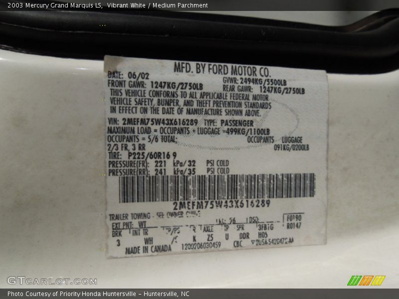Vibrant White / Medium Parchment 2003 Mercury Grand Marquis LS