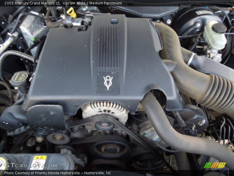 Vibrant White / Medium Parchment 2003 Mercury Grand Marquis LS