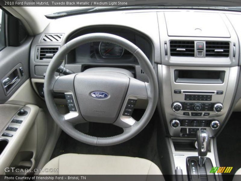 Tuxedo Black Metallic / Medium Light Stone 2010 Ford Fusion Hybrid